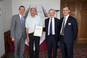 Receiving the award: in the centre, Nick from the station and Mark from LRSP