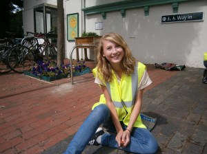 Emily weeding the front